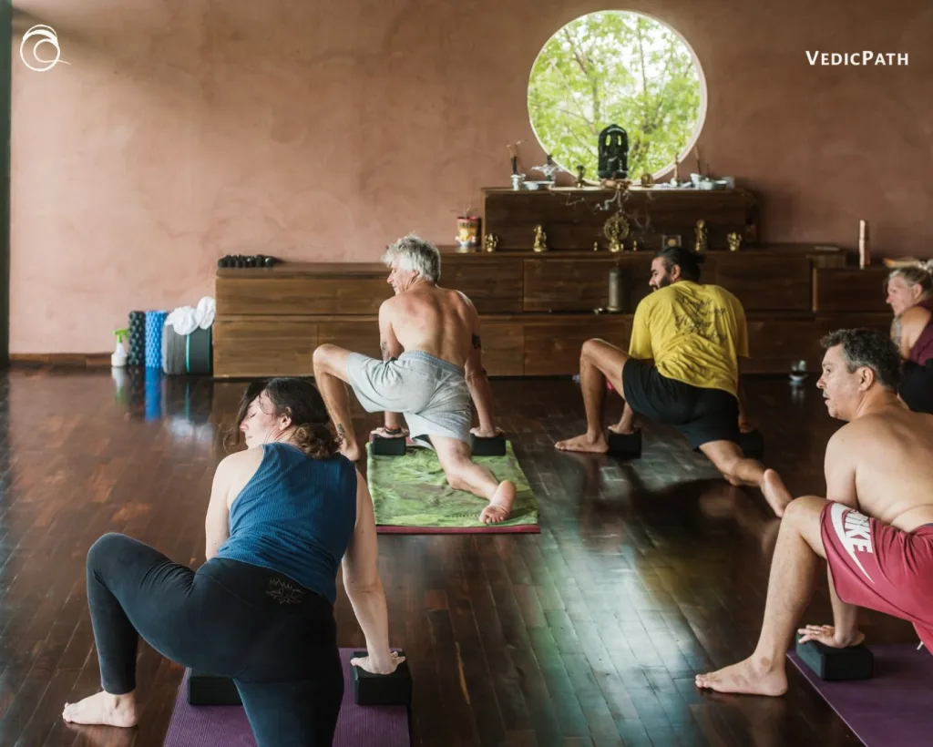 Yoga students practicing asana in the VedicPath shala