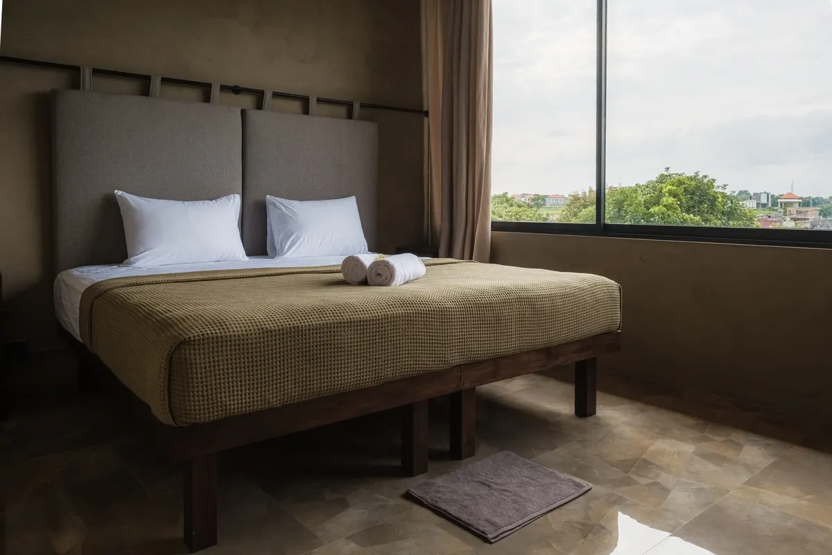 A private room at Vedic Path Bali prepared for a quiet stay