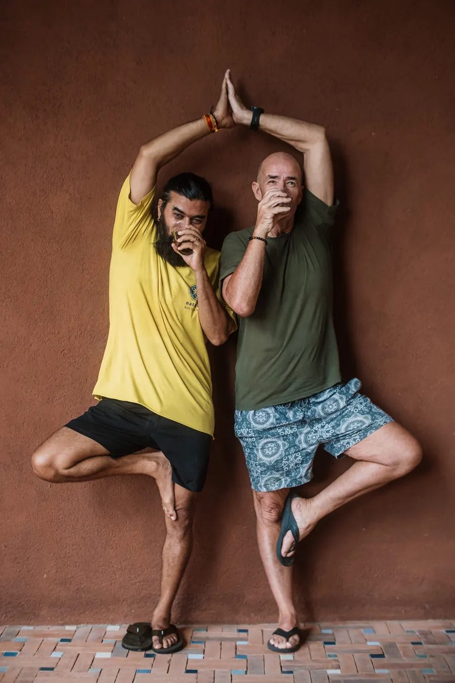 Two guests smiling playfully after a shared morning practice at Vedic Path Bali