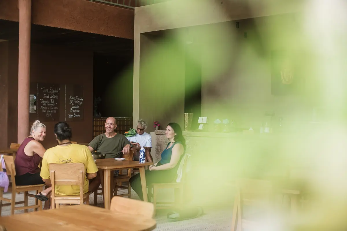 Guests sharing breakfast together in the Vedic Path dining area