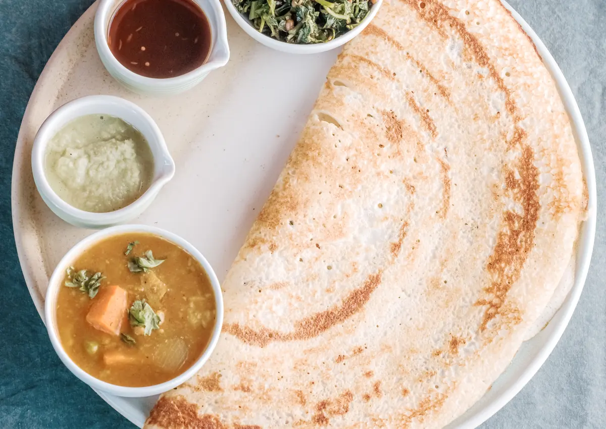 A Vedic Path meal served with dosa and chutneys
