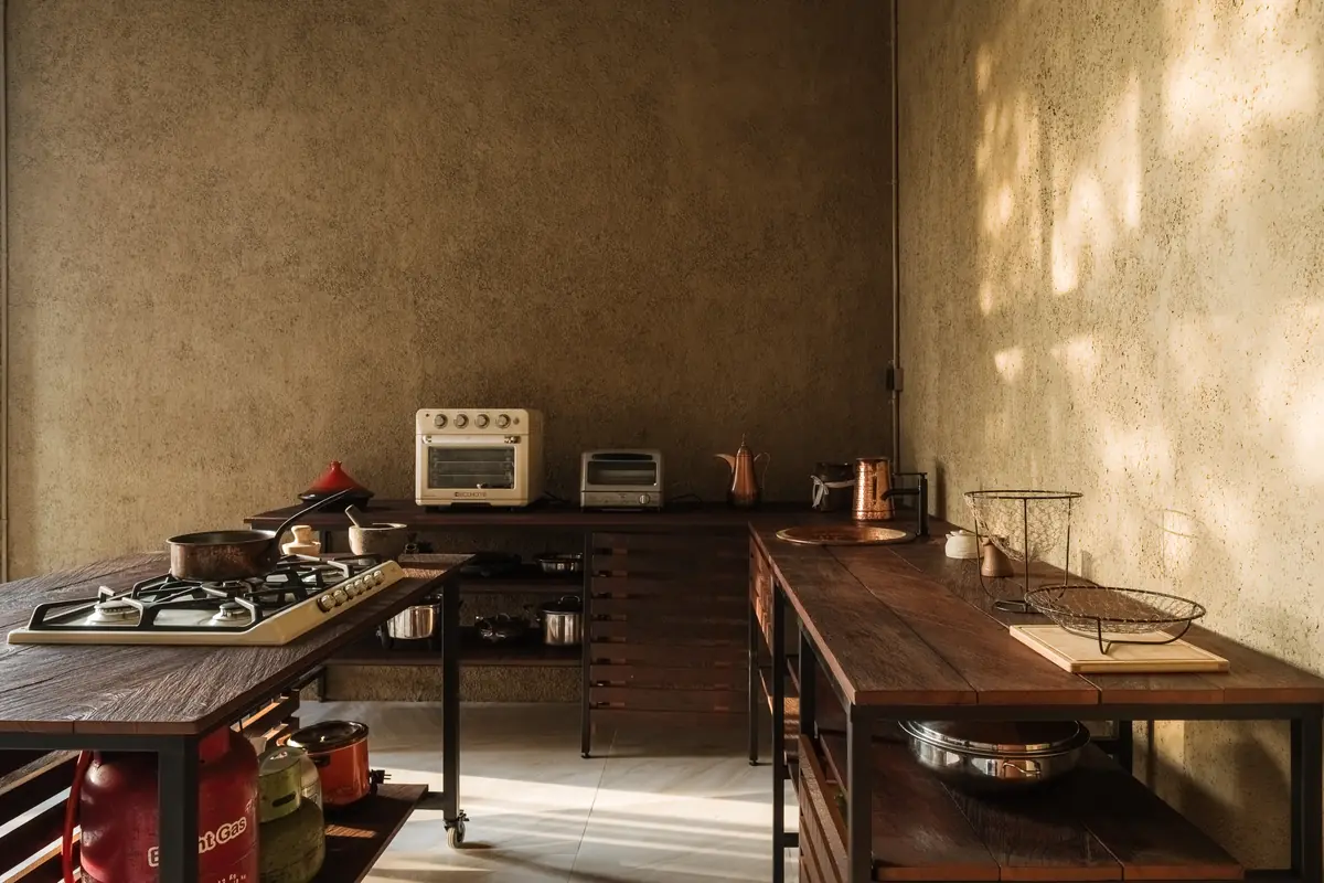 A warm kitchen classroom prepared for hands-on food sessions