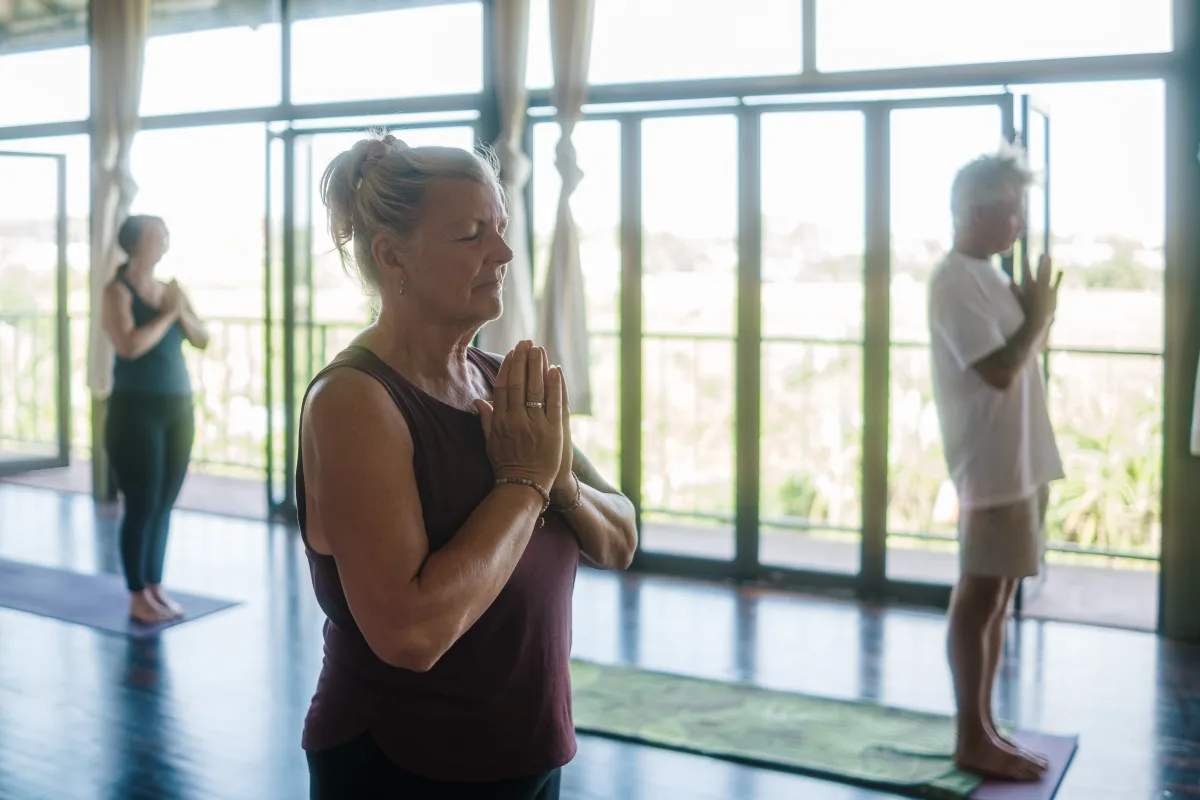 Students practicing quiet yoga therapy principles at Vedic Path Bali